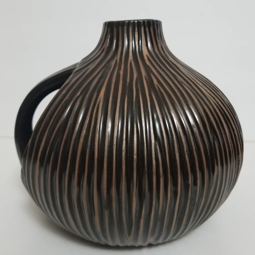Vintage textured brown jar